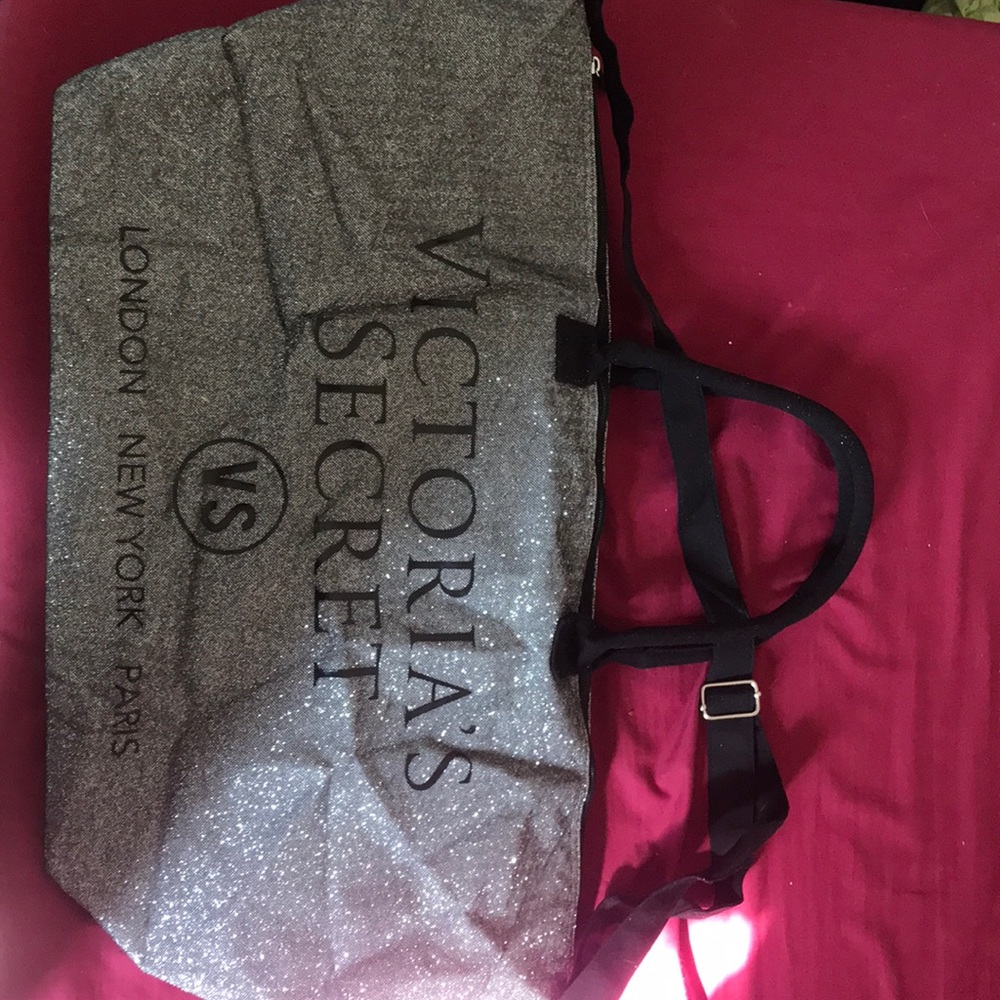 Victoria’s Secret silver sparkle travel bag.
